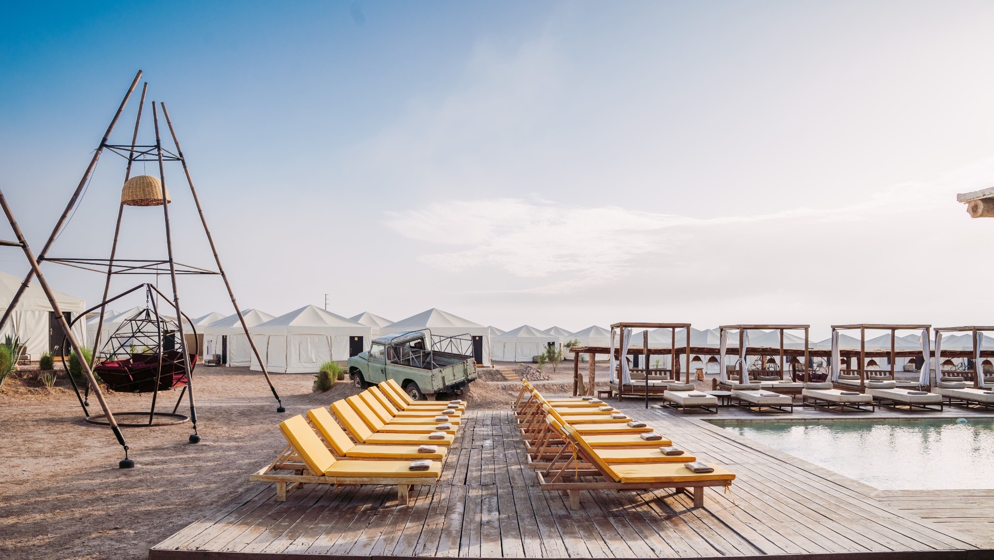Pool lunch at Terrasses d'Agafay, dinner at Soukoune, and 2 activities (round-trip shuttle transfer included).